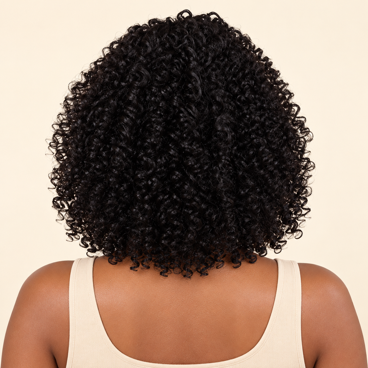 AI-generated visualization of the short natural-black afro-curly synthetic wig, back view on a Black woman